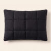 Direct overhead top view of The Black Pillow Original showcasing its symmetrical minimalist grid tufting pattern.